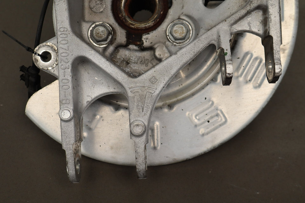 2012-20 Tesla Model S Left Rear Spindle Knuckle Hub ABS