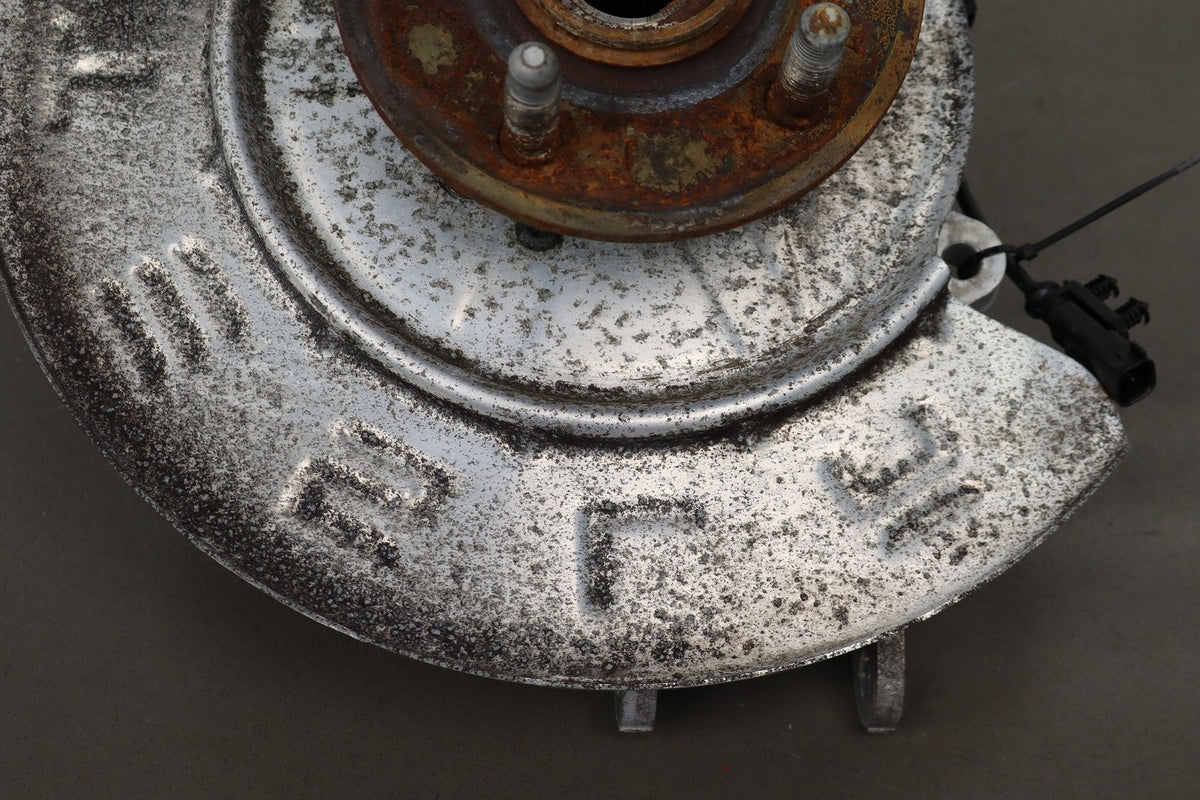 2012-20 Tesla Model S Left Rear Spindle Knuckle Hub ABS