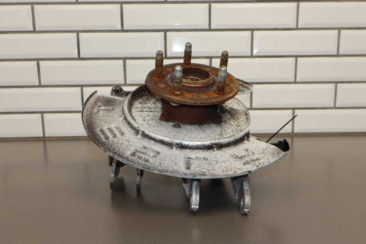 2012-20 Tesla Model S Left Rear Spindle Knuckle Hub ABS