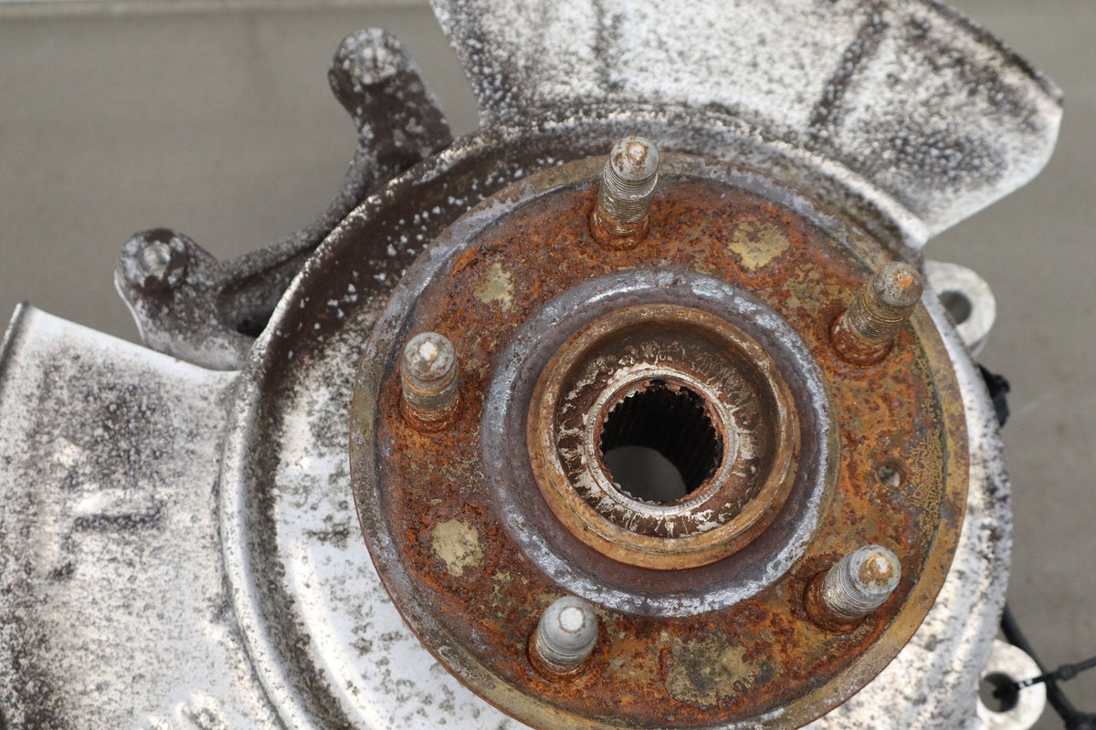 2012-20 Tesla Model S Left Rear Spindle Knuckle Hub ABS