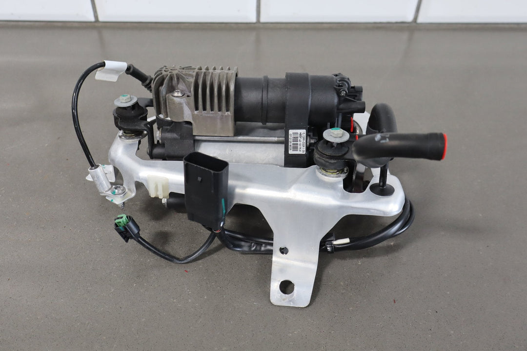 2012 - 2015 Tesla Model S MS Air Suspension Compressor Pump Unit w/ Bracket Assy