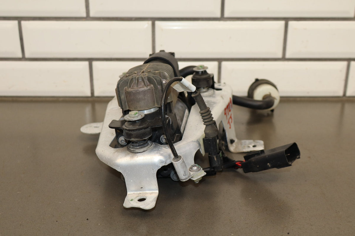2012-2015 Tesla Model S MS Air Suspension Compressor Pump Unit w/ Bracket Assy