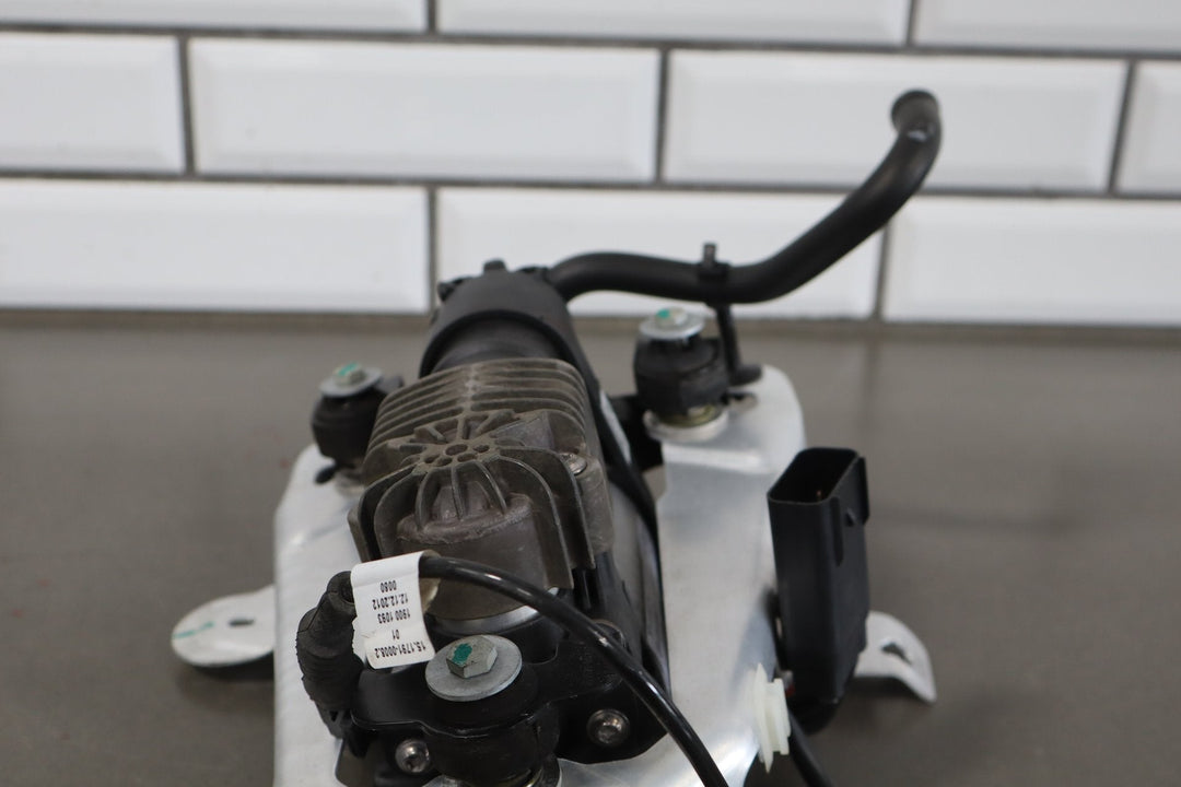 2012 - 2015 Tesla Model S MS Air Suspension Compressor Pump Unit w/ Bracket Assy