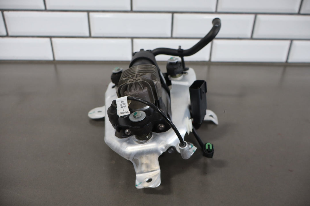2012 - 2015 Tesla Model S MS Air Suspension Compressor Pump Unit w/ Bracket Assy