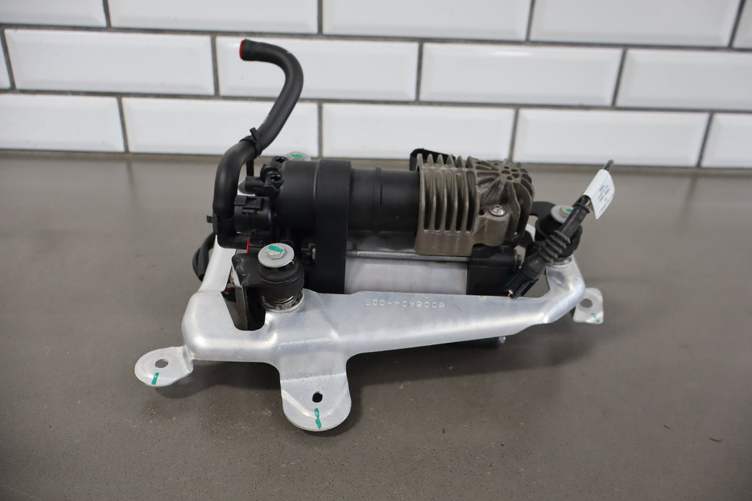 2012 - 2015 Tesla Model S MS Air Suspension Compressor Pump Unit w/ Bracket Assy
