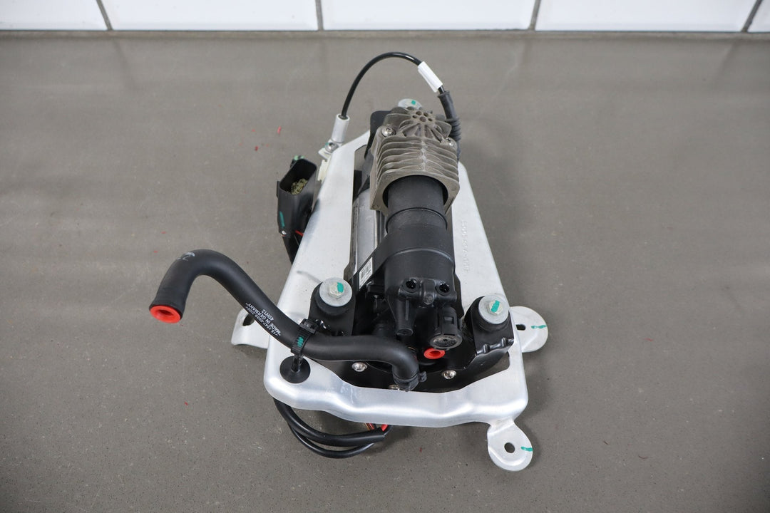 2012 - 2015 Tesla Model S MS Air Suspension Compressor Pump Unit w/ Bracket Assy