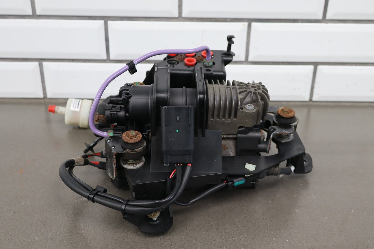 2012-2015 Tesla Model S MS Air Suspension Compressor Pump Unit w/ Bracket Assy