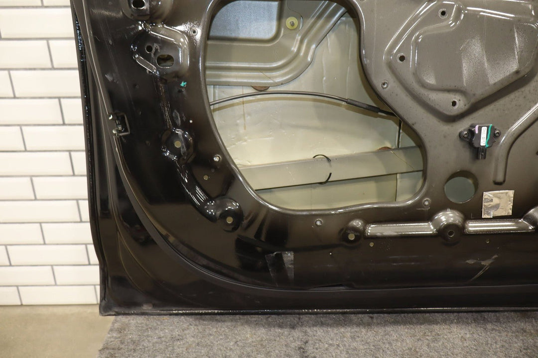 2012 - 2016 Tesla S Left Front Door Shell (Black PBSB)