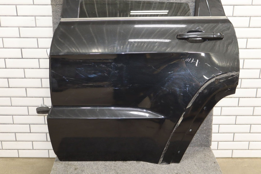 2014 Jeep Grand Cherokee Left Rear Door Black ( PXR )