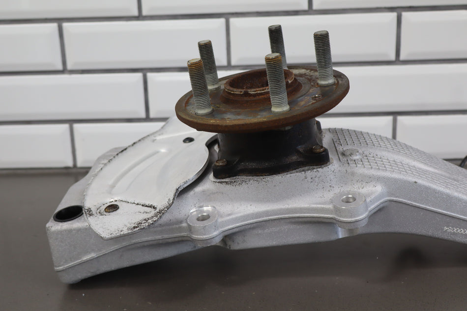 2012-2016 Tesla Model S RWD Driver Left Front Spindle Knuckle OEM
