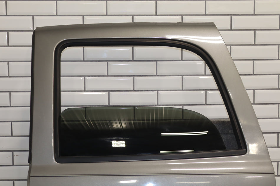 2001-2006 GMC Yukon Left Rear Door Steel Grey ( 16U ) 89023021