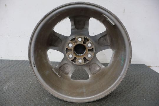 09-14 Nissan Xterra 16" OEM Rear Wheel (Face Marks) Silver With Center Cap