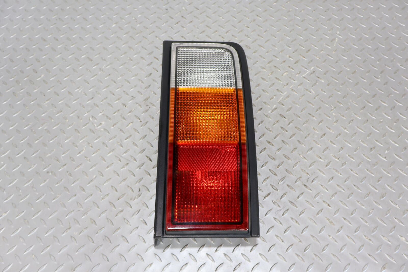 03-04 Hummer H2 Driver Left Rear Tail Light (Tested) Metal Mounting Tabs Missing