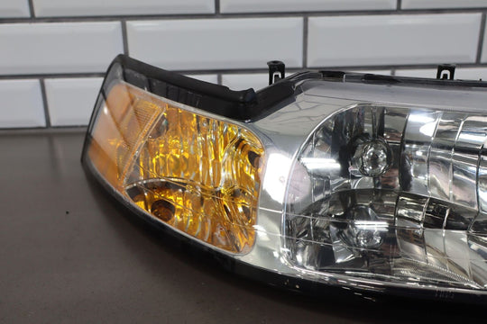 99-04 Ford Mustang TYC Aftermarket Headlight Pair (Left / Right) Clean Lenses