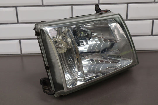 98-05 Toyota Land Cruiser Right Passenger Headlight Lamp *Repaired Tab*