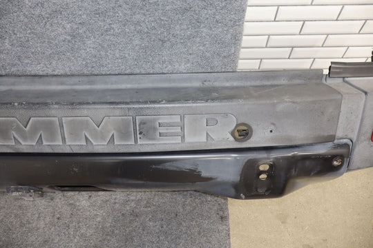 06-07 Hummer H2 SUV OEM Rear Bumper Bar W/Tail Light End Caps (Textured Black)