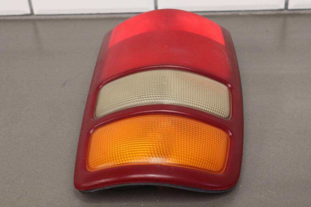 00-03 Chevy Suburban / Tahoe Driver Left OEM Tail Light Tail Lamp