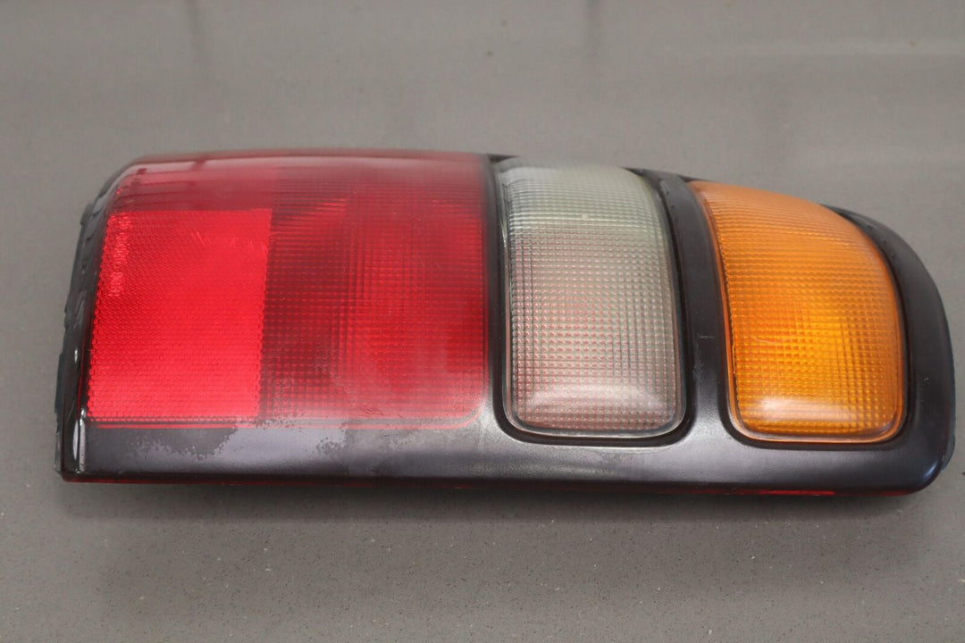 04-06 Chevy Tahoe / Suburban OEM Tail Lights (Pair Left/Right)