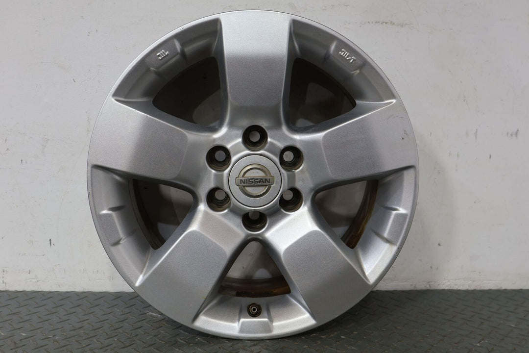 09-14 Nissan Xterra 16" OEM Front Wheel (Face Marks) Silver With Center Cap