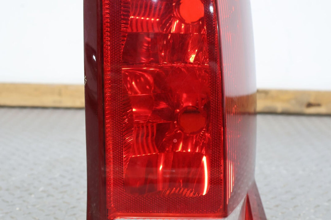 02-06 Cadillac Escalade Right RH Rear OEM Tail Light Lamp (Tested) Solid Mount