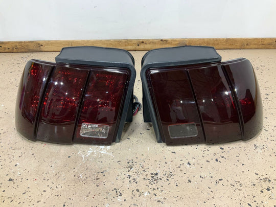 99-04 Ford Mustang Aftermarket Spray Tinted Tail Light Pair (Left/Right)