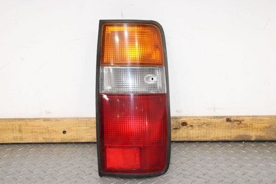 91-97 Toyota Land Cruiser Right RH Passenger Tail Light OEM (Mounted Solid)