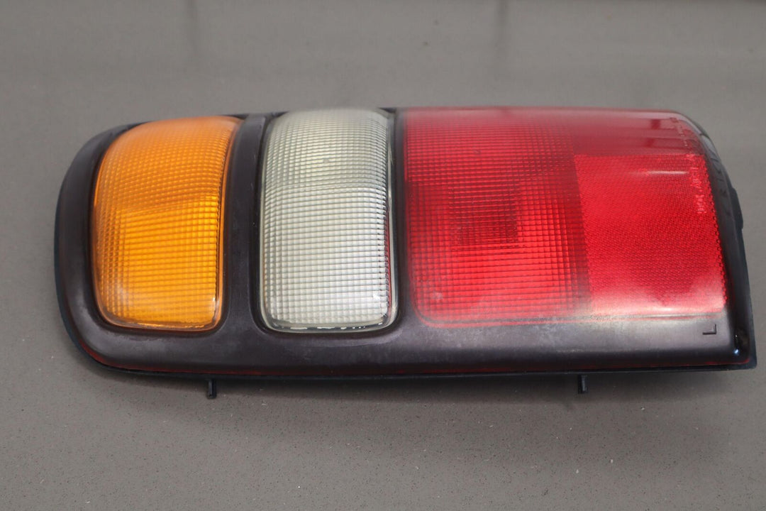 04-06 Chevy Tahoe / Suburban OEM Tail Lights (Pair Left/Right)