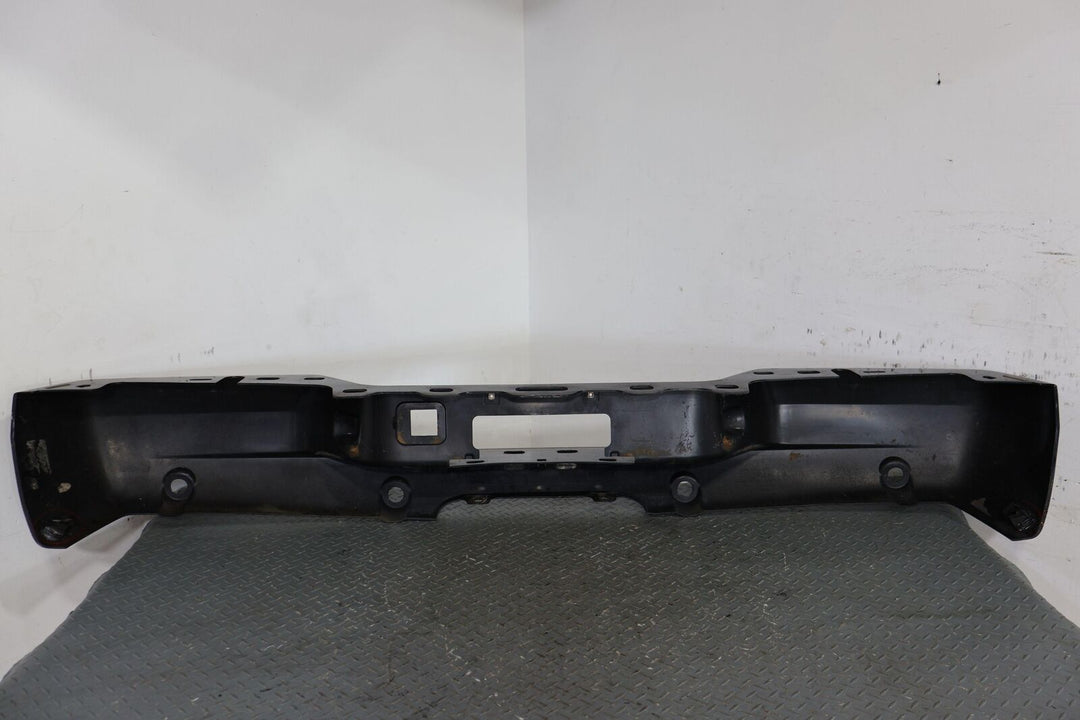 03-06 Cadillac Escalade OEM Rear Bumper Cover (Black Raven 41u) Sold Bare