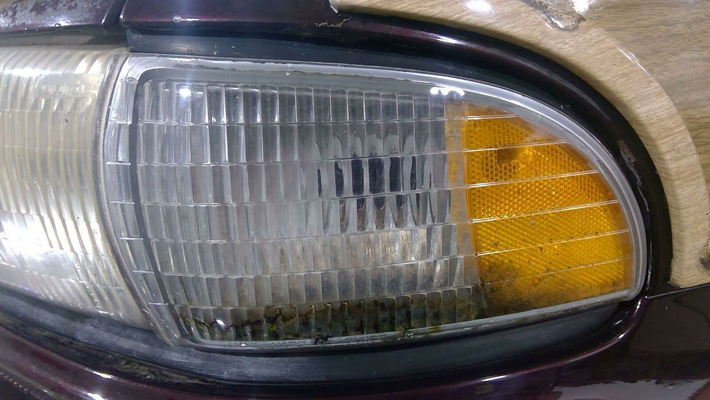 91-96 Chevy Caprice Driver Left Headlight with Marker Light OEM