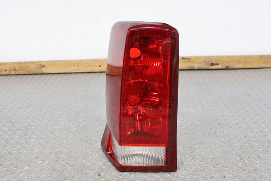 02-06 Cadillac Escalade Left LH Rear OEM Tail Light Lamp (Tested) Solid Mount