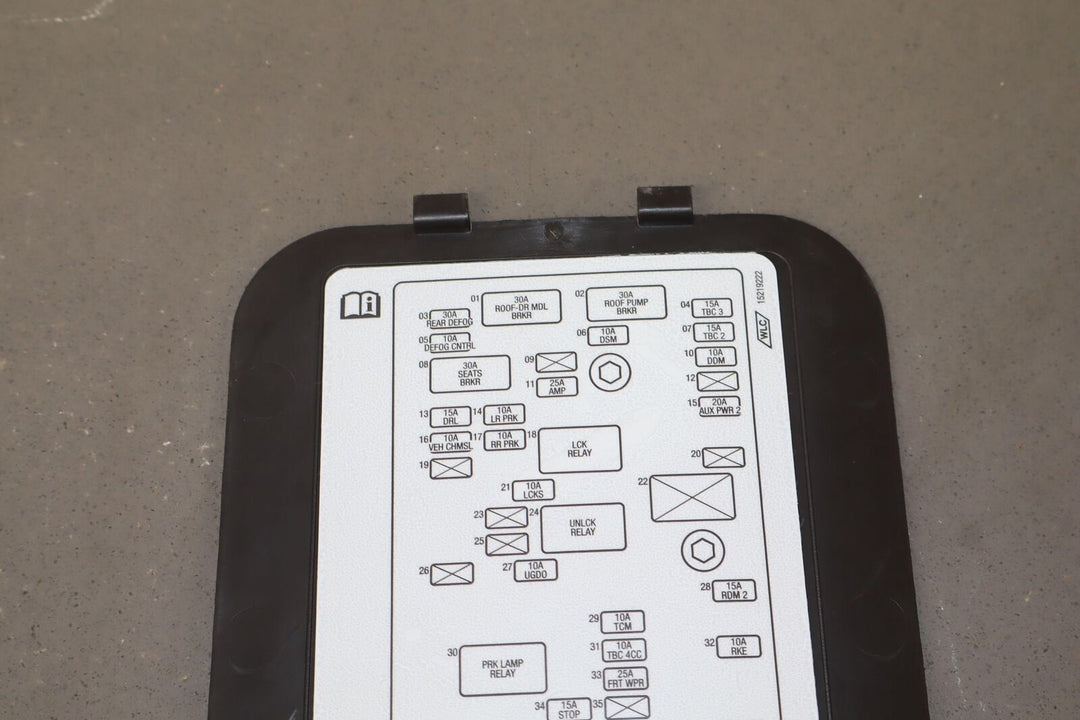 03-06 Chevy SSR Fuse Box Door (Behind Passenger Seat)