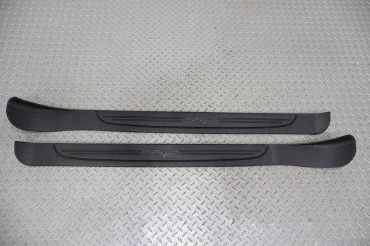 03-06 Chevy SSR Pair LH & RH Outer Door Sill Entry Plates (Ebony 19i)