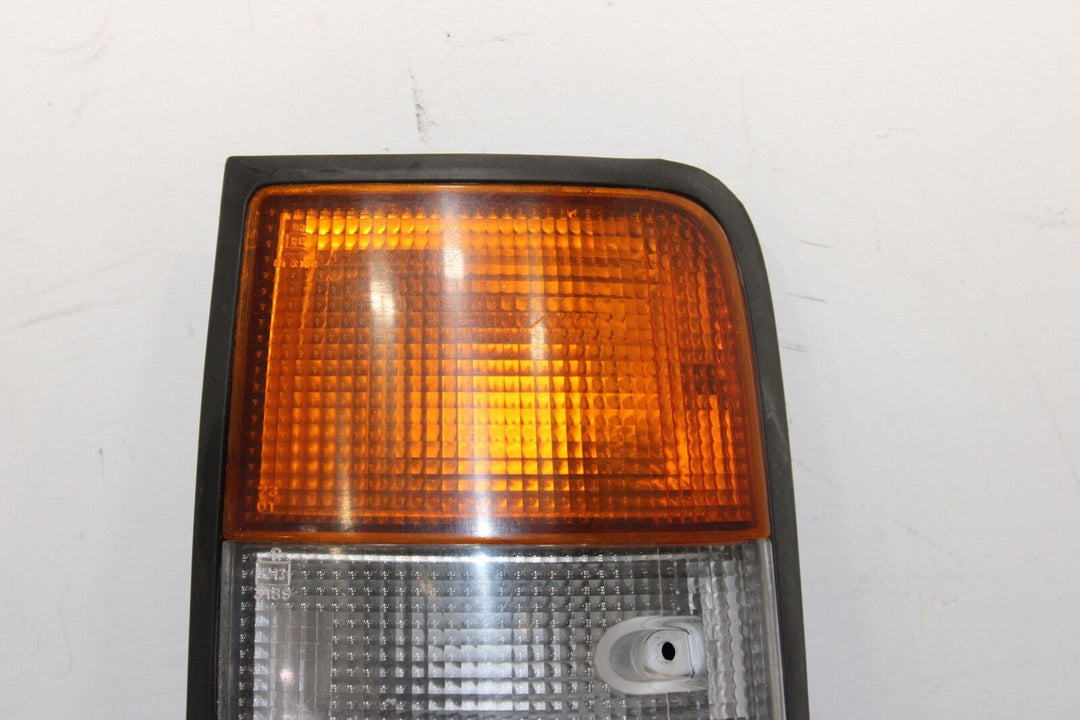 91-97 Toyota Land Cruiser Right RH Passenger Tail Light OEM (Mounted Solid)