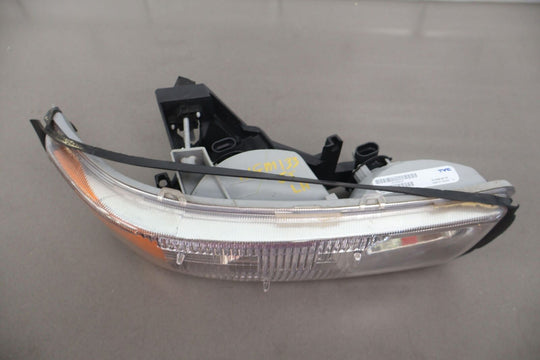 03-06 GMC Sierra Yukon Left LH Aftermarket TYC Headlight Lamp (20-5568-00-1N)