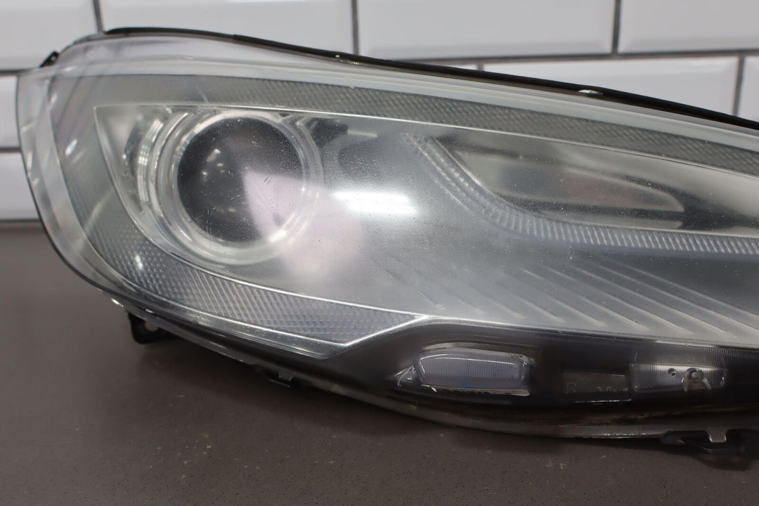 2012-2016 Tesla Model S Passenger Right Headlight (One Repaired Tab)