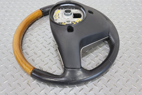 05-07 Cadillac XLR Black Leather Steering Wheel W/ Light Wood Trim (Black 19i)