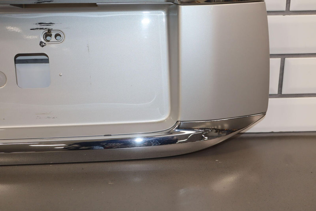 10-23 Lexus GX460 OEM Tail Finish Panel (Chrome&Tungsten Pearl) W/ Plate Lights