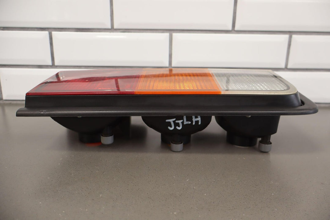 03-04 Hummer H2 Left LH Driver Tail Light Tail Lamp (Body Mounted) OEM Tested