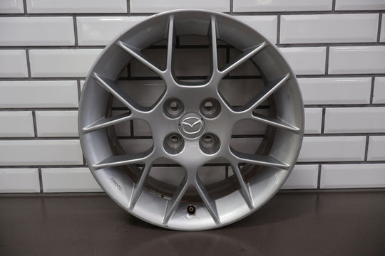 02 Mazda Miata Special 16x6.5 Enkei 7 Twin Spoke Wheel (Silver) Curb Rash