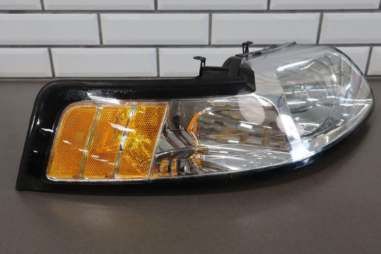 99-04 Ford Mustang TYC Aftermarket Headlight Pair (Left / Right) Clean Lenses