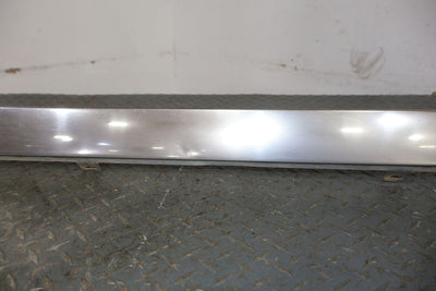 87-89 Cadillac Brougham Right Chrome OEM Rocker Moulding (Lt. Weathered) Dented