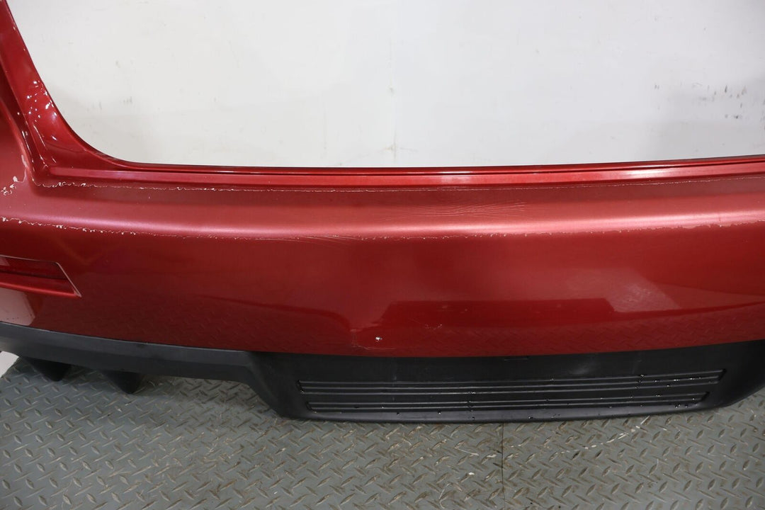 08-15 Mitsubishi Lancer EVO X Rear OEM Bumper (Rally Red P26) USDM See Photos