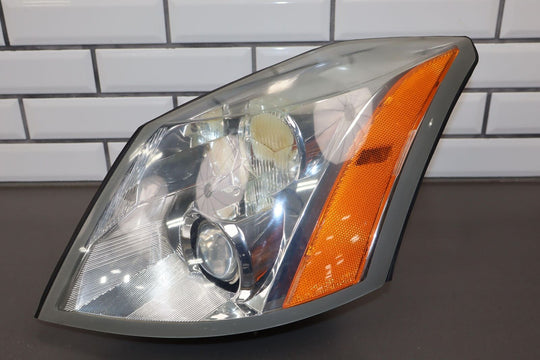 04-05 Cadillac XLR Left Driver Headlight Lamp *Cracked Housing**Burnt Signal*