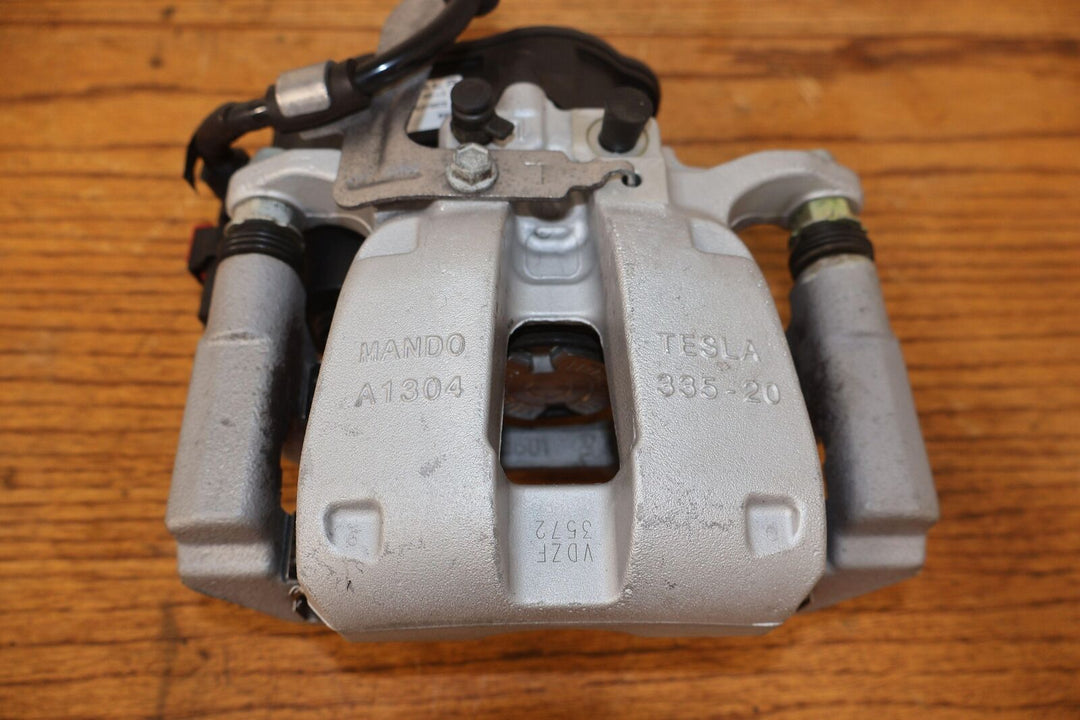 17-23 Tesla Model 3 Rear Left LH OEM Brake Caliper (1044623-00-I) W/Park Brake