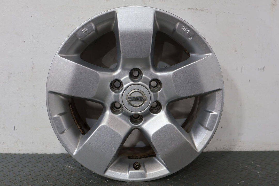 09-14 Nissan Xterra 16" OEM Rear Wheel (Face Marks) Silver With Center Cap