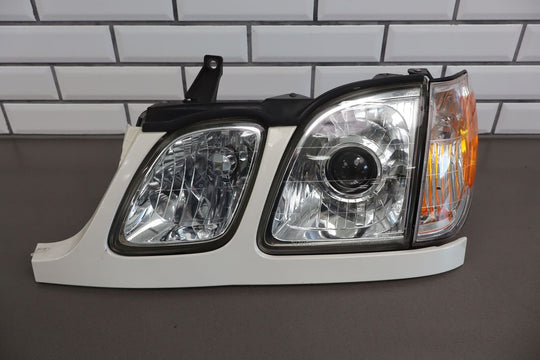 98-02 Lexus LX470 Left Driver Head Light Lamp Golden Pearl (057) *PARTS ONLY*