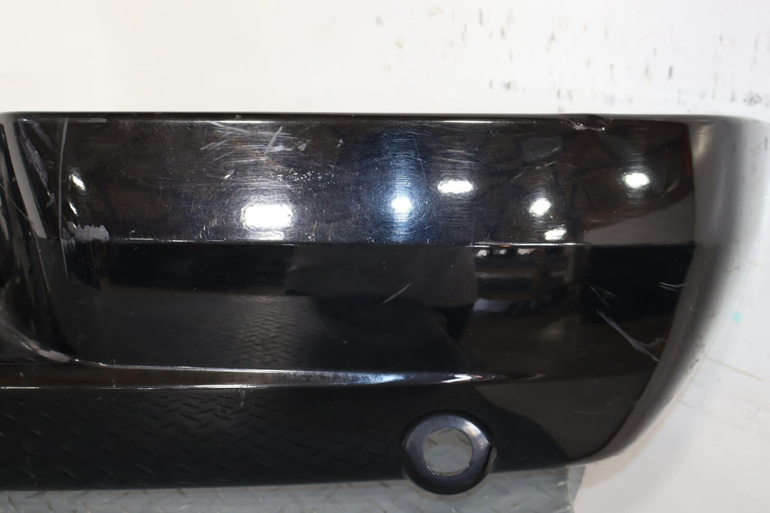 03-06 Cadillac Escalade OEM Rear Bumper Cover (Black Raven 41u) Sold Bare