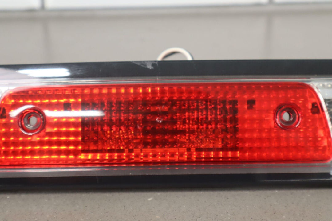 19-22 Ram 1500 Crew Cab OEM Incandescent 3rd Brake Light W/Black Housing -Tested