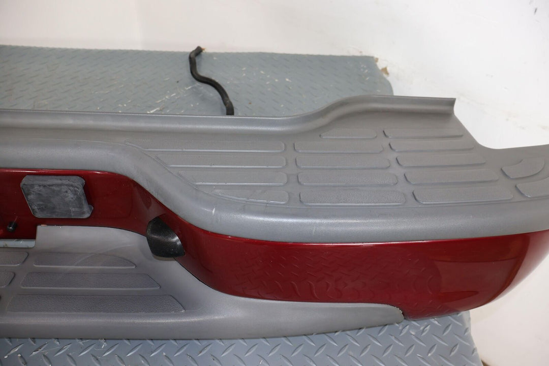 01-06 Chevy Tahoe Z71 Rear Bumper (Sport Red 63u) Mild Dents On Both Corners