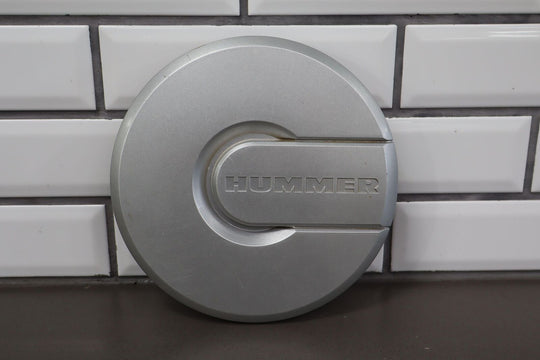 2003-2007 Hummer H2 OEM Silver Wheel Center Cap (9594461)